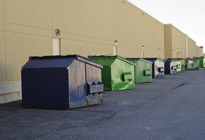 large trash container at construction site in Albion