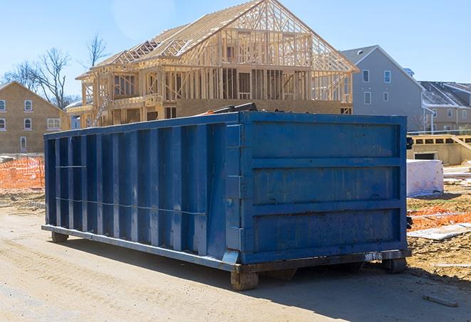 a set of outdoor trash cans for residential use